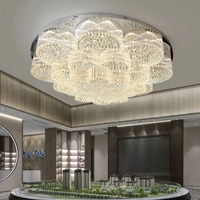 Đèn chùm pha lê thả thông minh PL024 gồm 3 tầng dùng thanh pha lê trắng và hạt pha lê trắng, mắt COB dimer 3 màu có điều khiển xa, mâm tròn inox gươngvàng, KT(mm): D1500 x H550